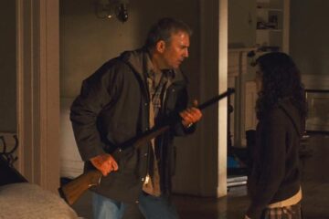 The New Daughter 2009 Movie Scene Kevin Costner as John James holding a shotgun in front of his daughter Ivana Baquero as Louisa