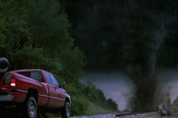 Twister [1996] Movie Red truck towing a tornado monitoring device in front of a huge twister scene