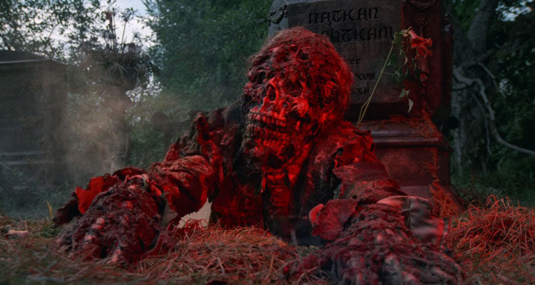 Creepshow 1982 Movie Scene Zombie coming out of his grave to eat the living