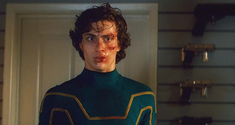 Kick-Ass 2010 Movie Scene Aaron Taylor-Johnson as Dave Lizewski AKA Kick-Ass without his mask in Big Daddy's weapons room