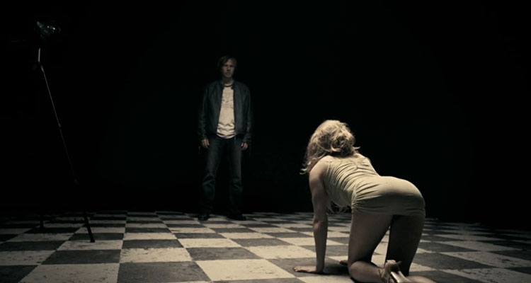 A Serbian Film 2010 Movie Scene A girl in short dress slowly crawling towards Milos played by Srdjan Zika Todorovic