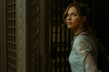 The Resident 2011 Movie Scene Hilary Swank as Dr. Juliet entering her apartment building for the first time