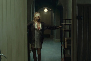 Julias Eyes 2010 Movie Scene Belen Rueda as Julia with a blindfold on stumbling through her house