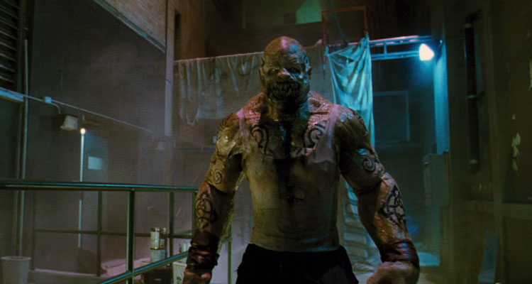 Dylan Dog Dead of Night 2011 Movie Scene A giant superzombie monster with strange tattoos all over its body