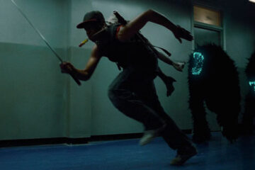 Attack The Block 2011 Movie Scene John Boyega as Moses running away from furry creatures holding a sword