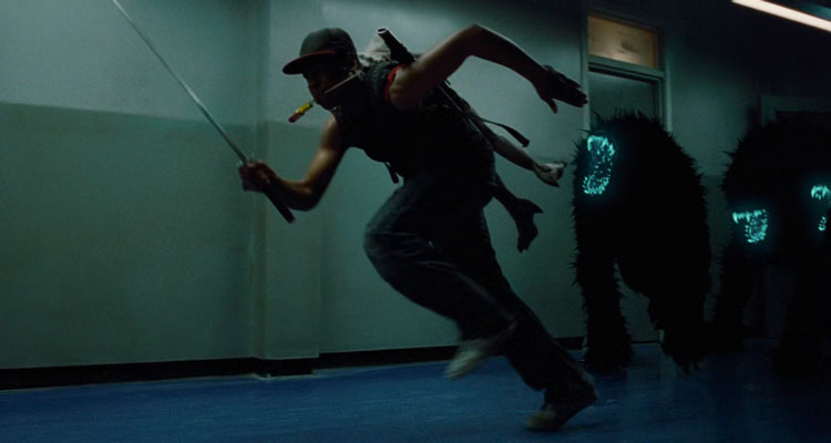 Attack The Block 2011 Movie Scene John Boyega as Moses running away from furry creatures holding a sword
