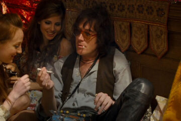 Mr Nice 2010 Movie Scene Rhys Ifans as Howard Marks smoking a joint with a couple of girls