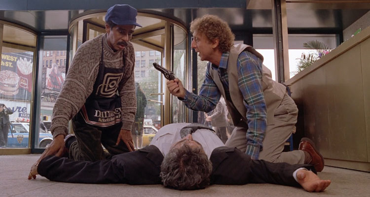 See No Evil Hear No Evil 1989 Movie Richard Pryor as Wally and Gene Wilder as Dave standing over a dead body in front of their shop