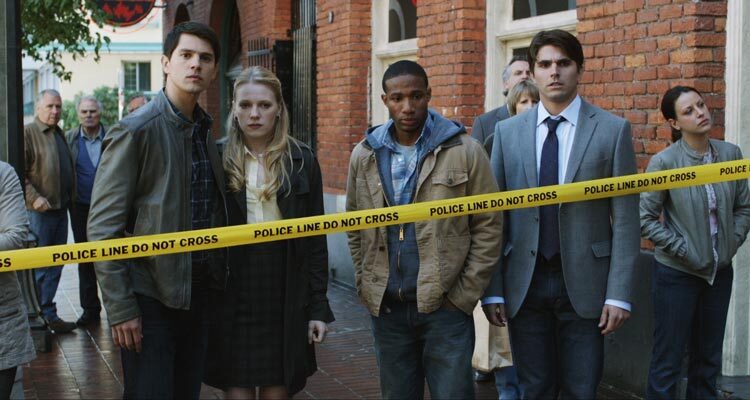 Final Destination 5 2011 Movie Scene Nicholas D'Agosto as Sam, Emma Bell as Molly, Arlen Escarpeta as Nathan and Miles Fisher as Peter Friedkin standing behind the police tape after another accident