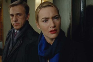 Carnage 2011 Movie Scene Kate Winslet as Nancy and Christoph Waltz as Alan about to leave but deciding to stay