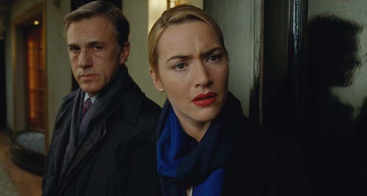 Carnage 2011 Movie Scene Kate Winslet as Nancy and Christoph Waltz as Alan about to leave but deciding to stay