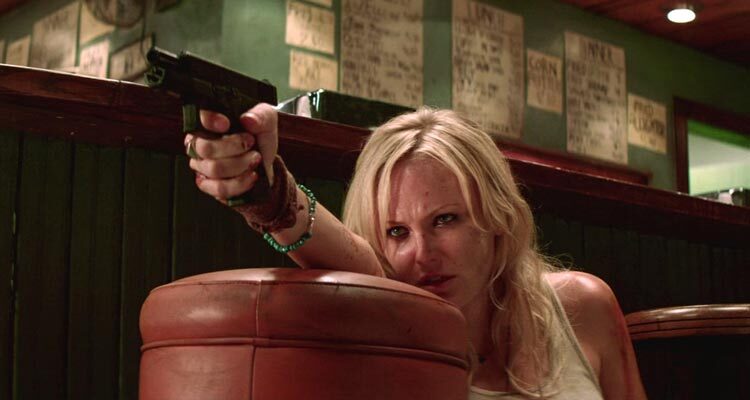 Catch 44 2011 Movie Scene Malin Akerman as Tes holding a gun in the diner