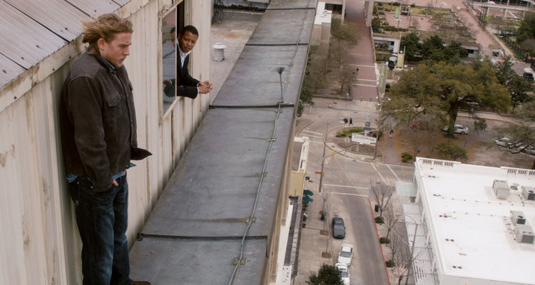 The Ledge 2011 Movie Scene Charlie Hunnam as Gavin standing on the top of the building talking to Terrence Howard as Det. Hollis Lucetti