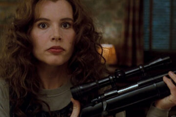 The Long Kiss Goodnight 1996 Movie Scene Geena Davis as Samantha Caine (Charly) holding a sniper rifle she just assembled