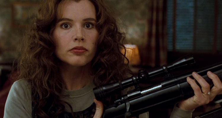 The Long Kiss Goodnight 1996 Movie Scene Geena Davis as Samantha Caine (Charly) holding a sniper rifle she just assembled