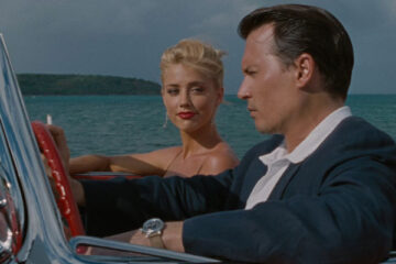The Rum Diary 2011 Movie Scene Johnny Depp as Kemp and Amber Heard as Chenault driving by the coast of Puerto Rico