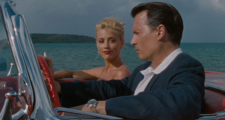 The Rum Diary 2011 Movie Scene Johnny Depp as Kemp and Amber Heard as Chenault driving by the coast of Puerto Rico