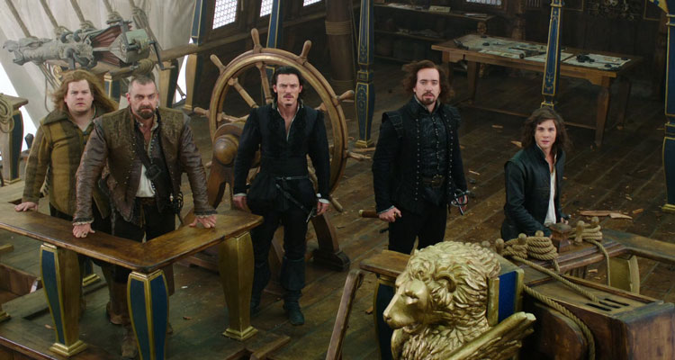 The Three Musketeers 2011 Movie Scene Logan Lerman as D'Artagnan, Matthew Macfadyen as Athos, Ray Stevenson as Porthos, Luke Evans as Aramis and James Corden as Planchet aboard their zeppelin ship