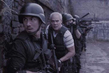 The Raid Redemption 2011 Movie Scene Joe Taslim as Jaka and Pierre Gruno as Wahyu leading their team into the hornet's nest