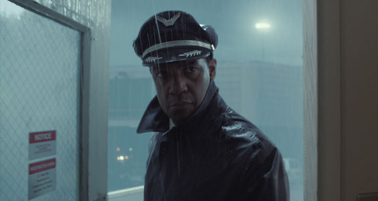 Flight 2012 Movie Scene Denzel Washington as Whip Whitaker about to fly a plane in bad weather