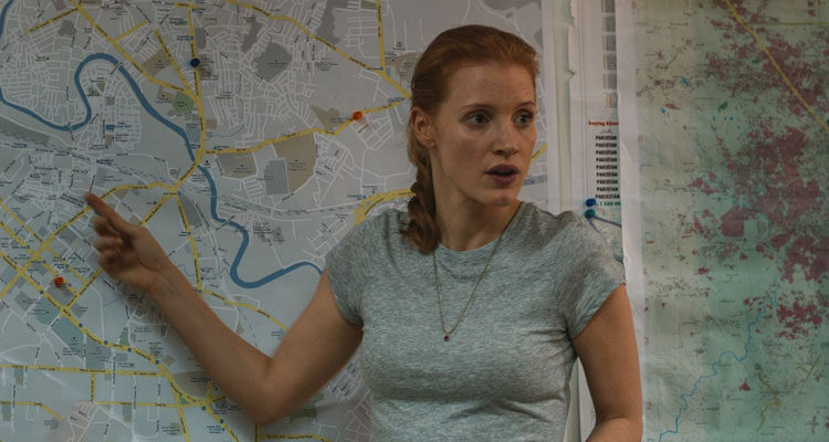 Zero Dark Thirty 2012 Movie Scene Jessica Chastain as Maya pointing on the map where she thinks Osama bin Laden is hiding