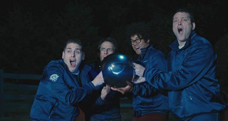 The Watch 2012 Movie Scene Ben Stiller as Evan, Vince Vaughn as Bob, Jonah Hill as Franklin and Richard Ayoade as Jamarcus holding a huge orb that can shoot lasers