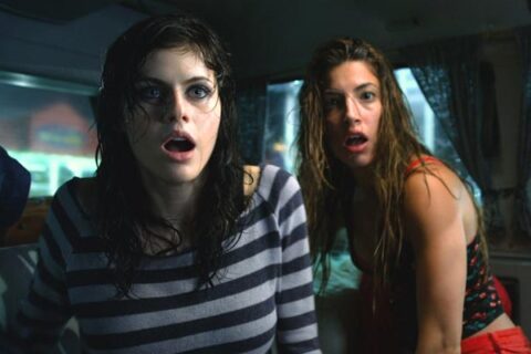 Texas Chainsaw 3D 2013 Movie Scene Alexandra Daddario as Heather and Tania Raymonde as Nikki surprised in the van