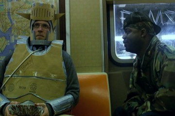 Murder Party 2007 Movie Scene Chris Sharp as Christopher Hawley riding the subway in his knight costume