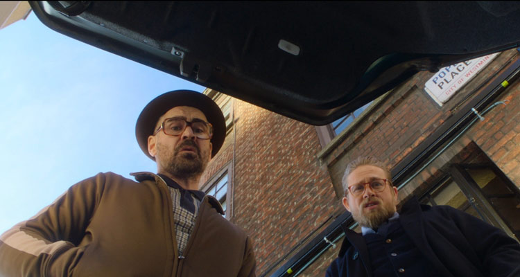 The Gentlemen 2019 Movie Review Charlie Hunnam as Ray and Colin Farrell as Coach looking at trunk of a car