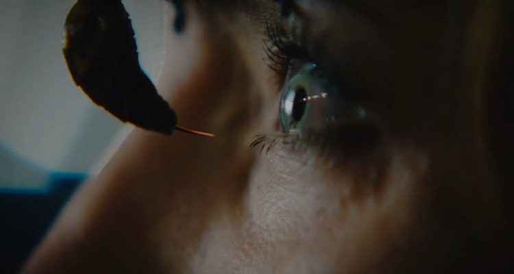 Stung 2015 Movie Giant wasp with her stinger out really close to the eye of the woman