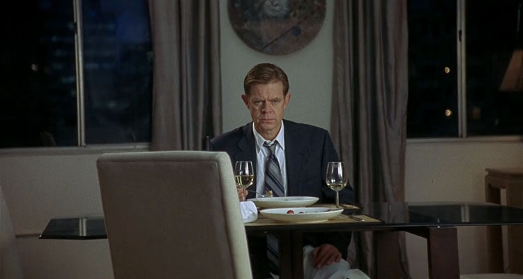 Edmond 2005 Movie William H. Macy at the dinner table thinking