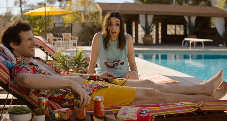 Palm Springs 2020 Movie Andy Samberg and Cristin Milioti sitting by the pool and drinking beer