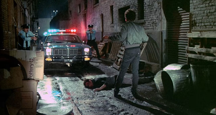 Fear City 1984 movie Tom Berenger with his hands up