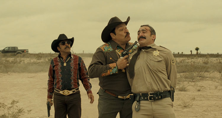 El Infierno 2010 Movie Damián Alcázar and Joaquín Cosio holding a gun to a policeman's face