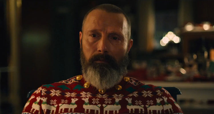 Riders of Justice 2020 Movie Mads Mikkelsen as Markus wearing a Christmas themed sweater
