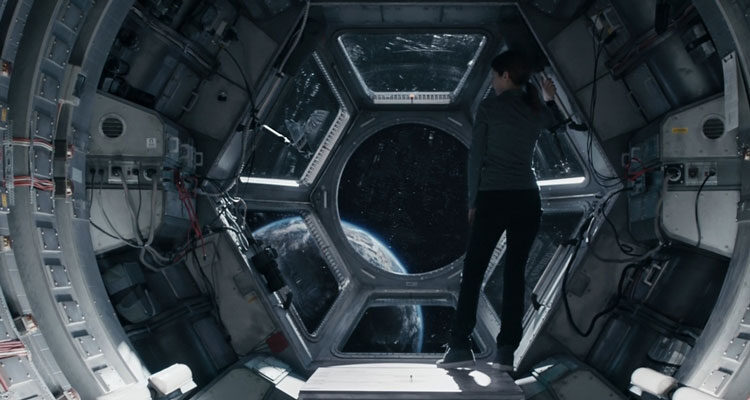 Stowaway 2021 Movie Anna Kendrick as Zoe Levenson looking at Earth from space