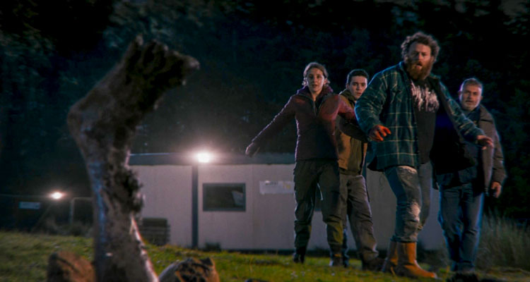 Boys From County Hell 2021 Movie Michael Hough, Louisa Harland, Nigel O'Neill and Jack Rowan retreating in terror as Abhartach's foot emerges from the ground
