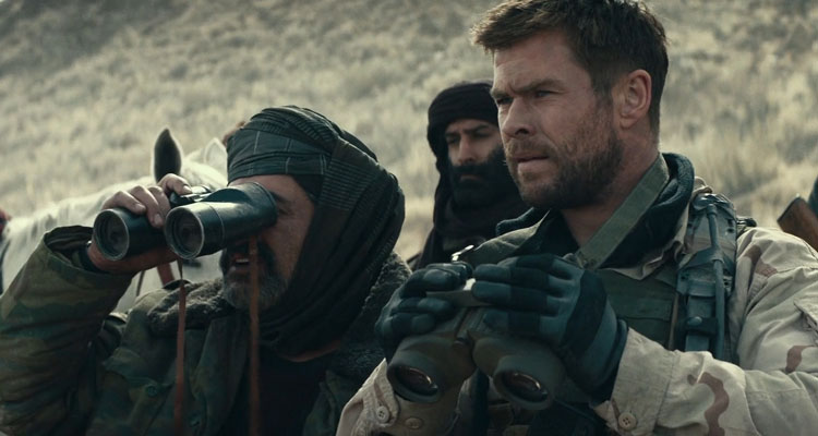 12 Strong 2018 Movie Scene Chris Hemsworth as Captain Mitch Nelson and Navid Negahban as General Dostum looking through binoculars