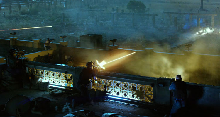 13 Hours 2016 Movie Scene Contractors firing their weapons from the top of the buildings with visible tracer rounds at a car
