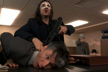 Killing Zoe 1993 Movie Scene Jean-Hugues Anglade as Eric holding a gun to hostage inside the bank