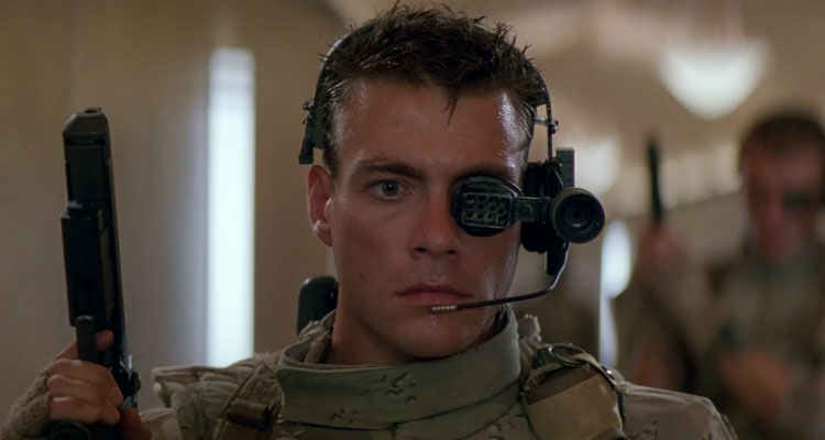 Universal Soldier 1992 Movie Scene Jean-Claude Van Damme as Luc Deveraux wearing an eye-piece and a gun