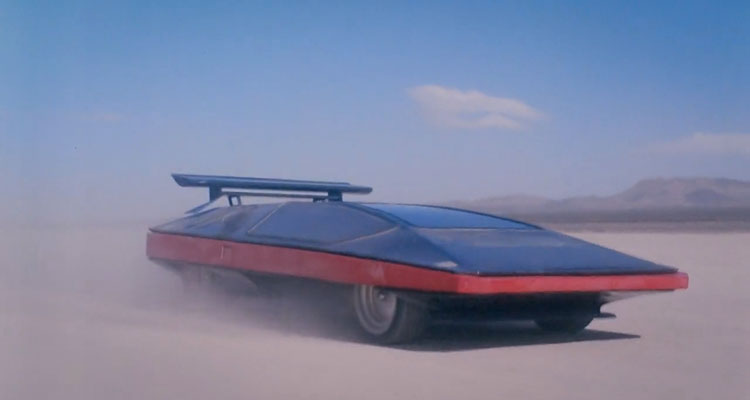Black Moon Rising 1986 Movie Scene The prototype car Wingho Concordia II racing through the desert