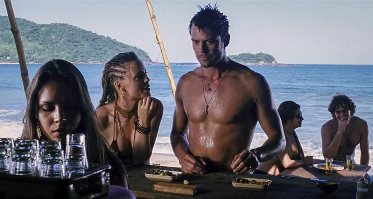Turistas 2006 Movie Scene Josh Duhamel as Alex and Melissa George as Pru ordering drinks at the beach bar in Brazil