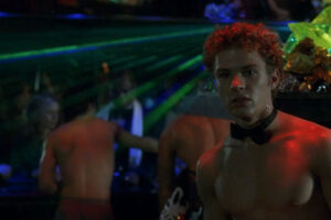 54 1998 Movie Scene Ryan Phillippe as Shane O'Shea shirtless and wearing just a bow tie behind the bar