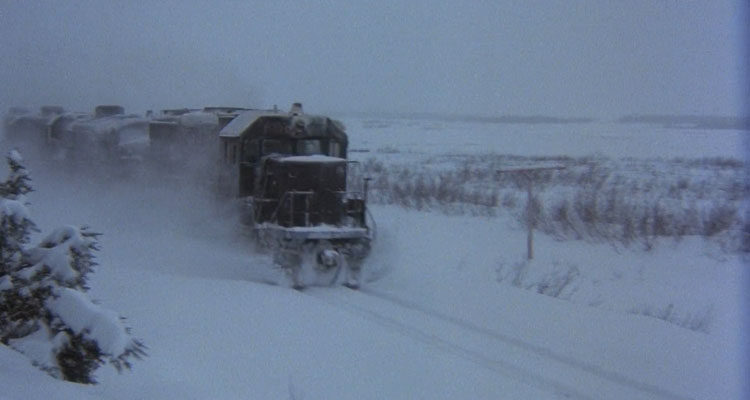 Runaway Train 1986 Movie Scene Train running through the snow-covered tracks
