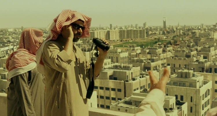 The Kingdom 2007 Movie Scene Two men looking at the city with binoculars