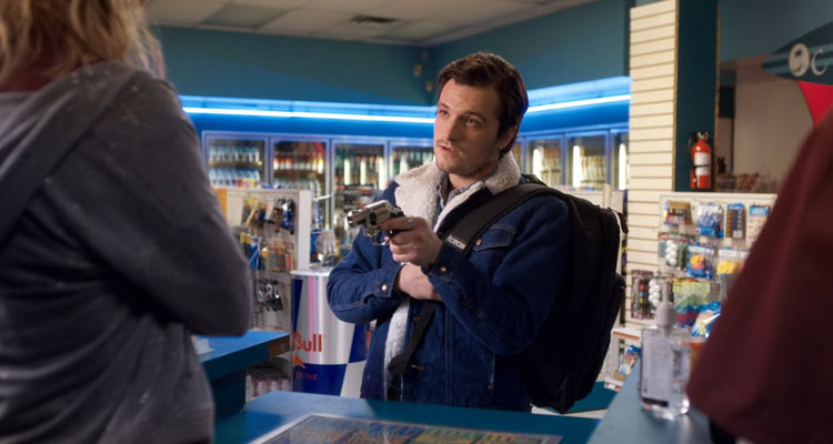 Burn 2019 Movie Scene Josh Hutcherson as Billy holding a gun inside of a gas station