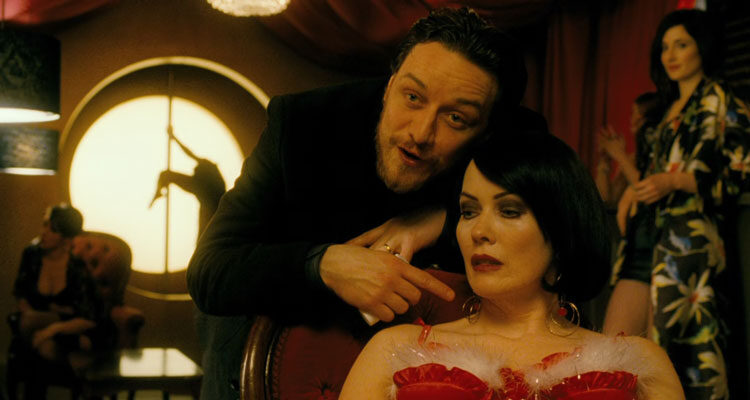 Filth 2013 Movie Scene James McAvoy as Bruce pointing at the prostitute in the brothel