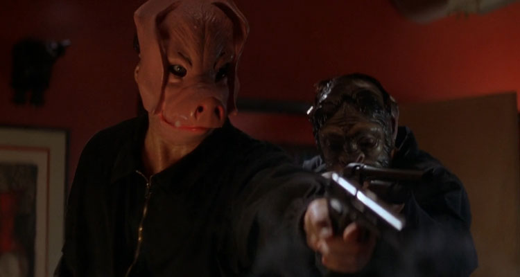 Phoenix 1998 Movie Scene A robber with a pig mask holding a gun