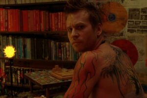 The Salton Sea 2002 Movie Scene Val Kilmer as Danny showing off his tattoos